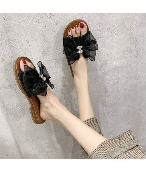 Ins leather sandals women's 2020 summer new one word drag wear flat bottomed all kinds of Korean women's shoes group buying trend