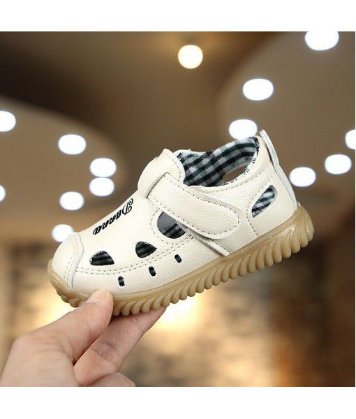 Boys' Baotou sandals 2019 summer new Korean children's solid color all-around beach shoes baby casual sandals trend